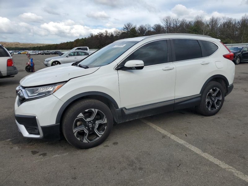 Card image of 2019 Honda Cr-V Touring with VIN 7FARW2H98KE029811