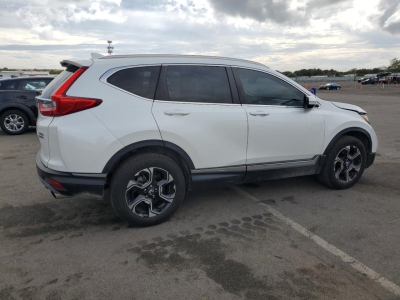 Thumbnail of 2019 Honda Cr-V Touring with VIN 7FARW2H98KE029811